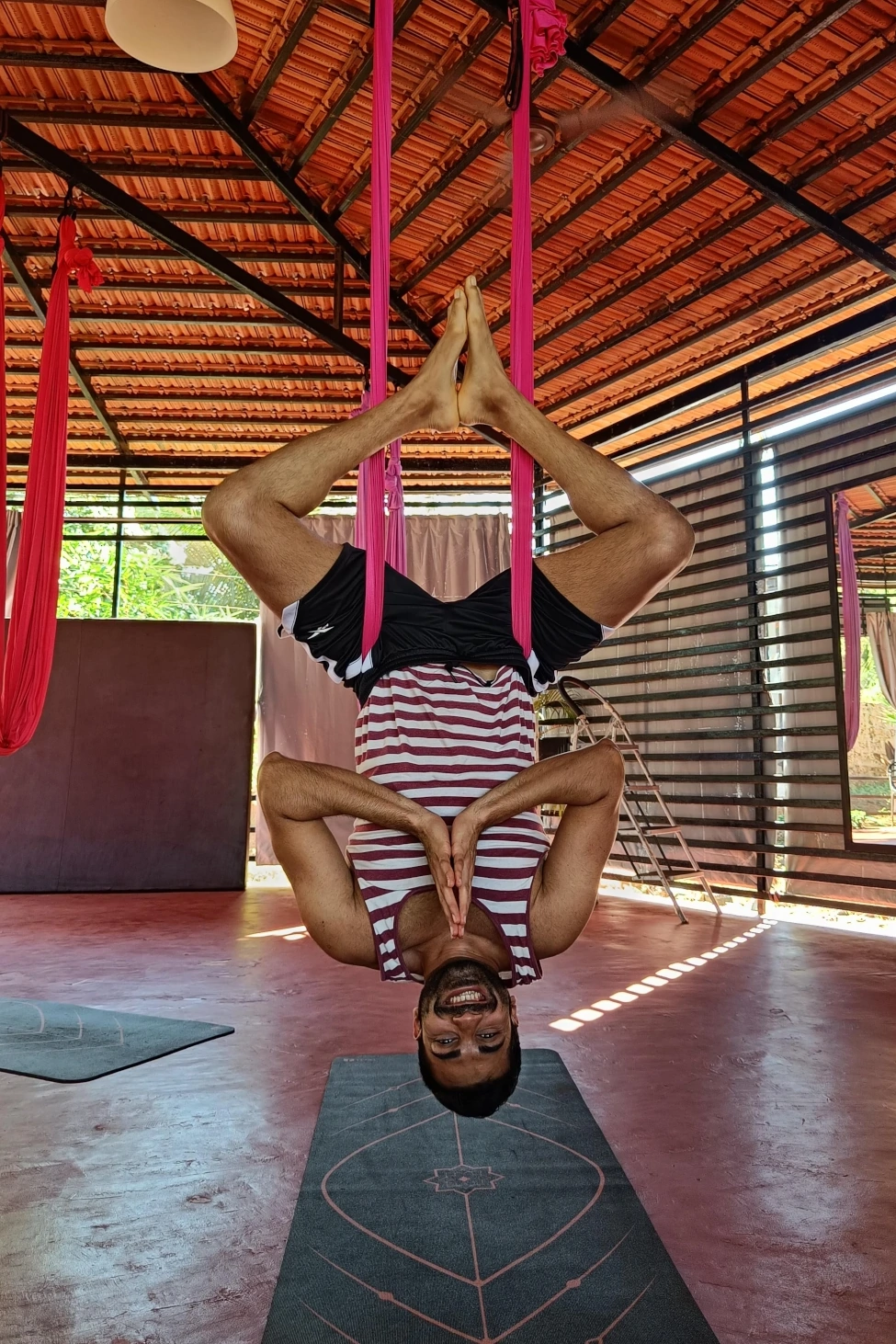 Aerial Yoga: What is it, Benefits and Can you do it at home? | HealthShots
